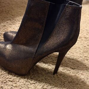 Elegant Black and Gold Women's Ankle Boots with heels